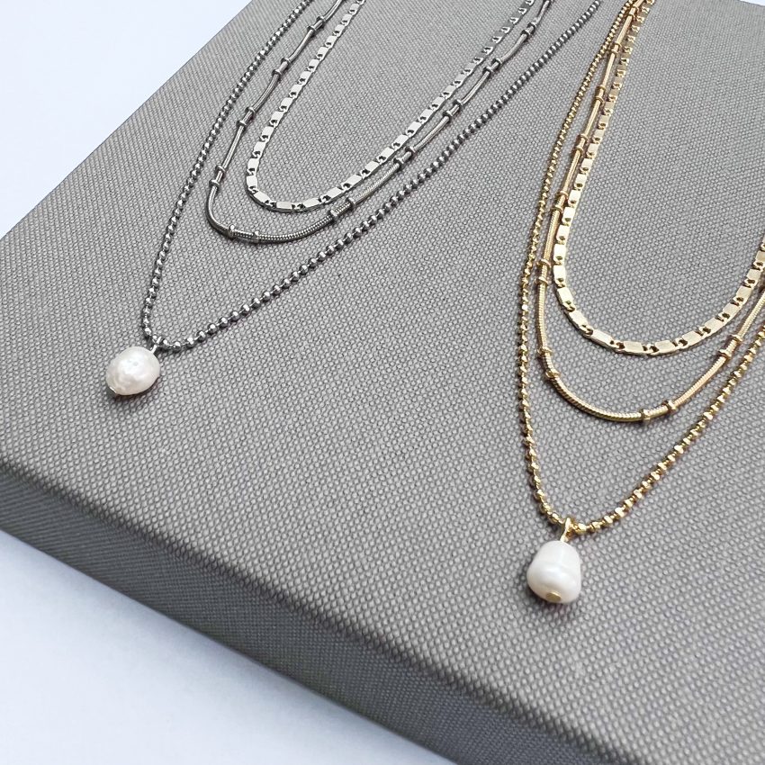Triple necklace - each one with a different and special element and the last one has a lovely charm of a pearl. Creates an elegant and chic layered look. Suitable with other necklaces. An elegant-looking necklace with the small addition that makes a big difference in any look. The length of the necklace is about 20 cm plus about 5 cm. The extension comes in a fancy package